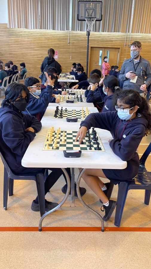 Students playing chess